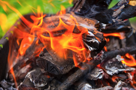 fire with flames on a grass backgroundの写真素材
