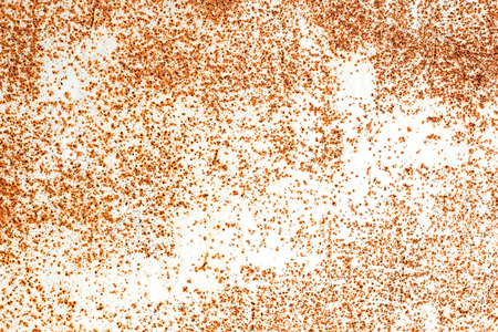 painted white sheet metal with a rust spotの写真素材