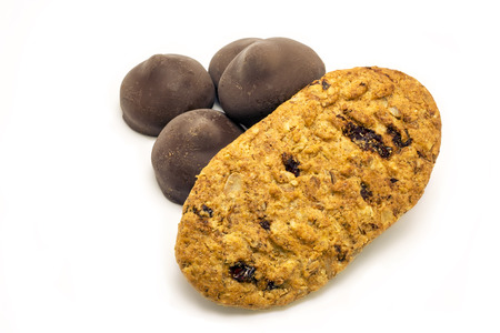 chocolates and biscuits on a white backgroundの写真素材