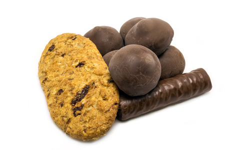 chocolates with delicious cookies on a white backgroundの写真素材
