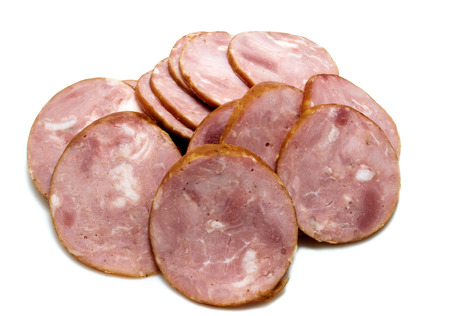 smoked sausage cutting rings laid out on a white backgroundの写真素材