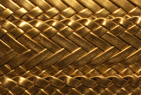 golden luxury background with textured leather braidedの写真素材