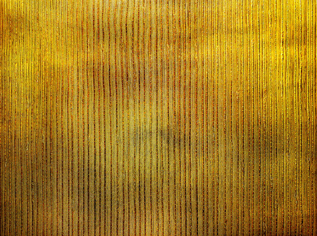golden luxury background texture with a relief patternの写真素材