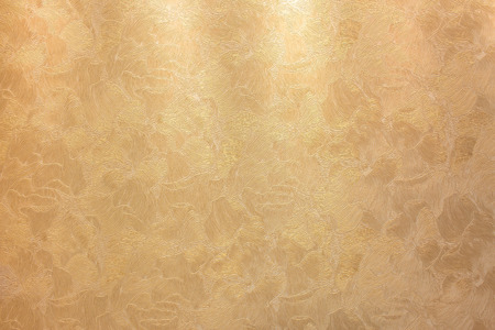 golden background  luxury texture with a relief pattern bronzeの写真素材