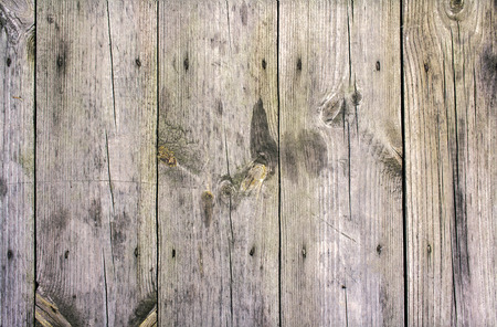 old wooden boards in a row wall backgroundの写真素材