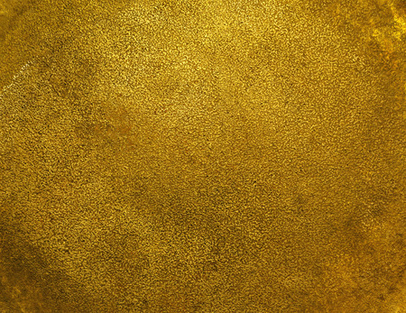 antique gold. relief, rich golden texture for backgroundの写真素材