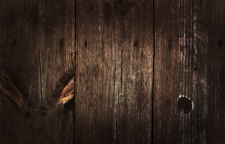 Old wooden texture with knots and cracksの写真素材