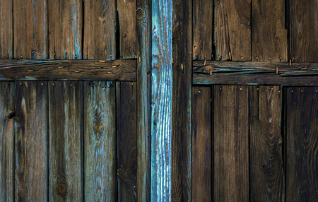 wood texture with knots and cracks for backgroundの写真素材