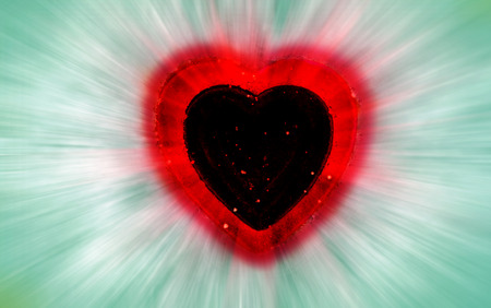 dark heart on a blured of snow. Happy Valentine's day.の写真素材