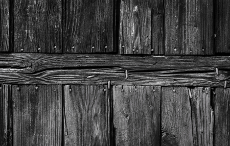 old wood texture with knots and cracks for backgroundの写真素材
