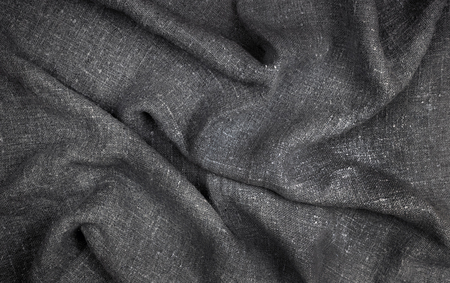 Burlap, natural coarse cloth, tablecloth with folds.の写真素材