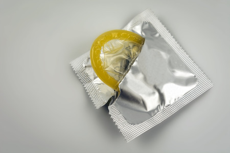 Condom close-up isolated. Contraceptive protection from pregnancy.の写真素材