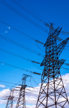  high-voltage  power lines at sunset. electricity distribution station. high voltage electric transmission tower. の写真素材