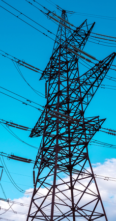  high-voltage  power lines at sunset. electricity distribution station. high voltage electric transmission tower. の写真素材