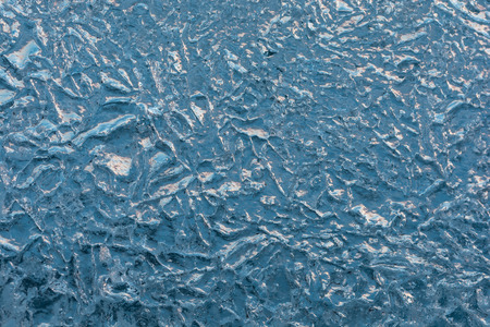 texture of the ice surface with bubbles. abstract winter background.