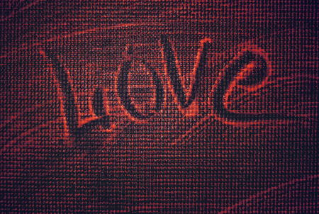 Love, the inscription on the foam. A declaration of love on a textured surface.の写真素材