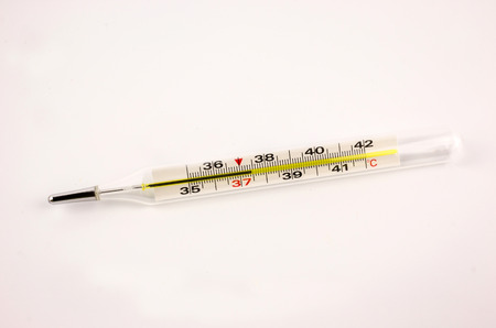 high body temperature on a thermometer. Symptom of the disease. thermometer close-up.の写真素材