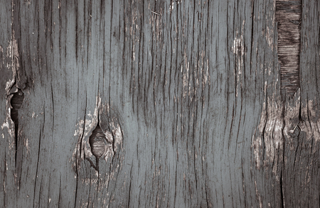 wood texture with knots and cracks for backgroundの写真素材