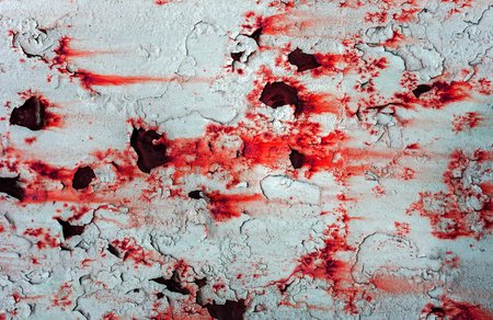 background sheet metal with rust and holesの写真素材