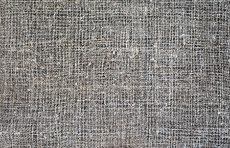 Burlap close-up, natural coarse cloth, tablecloth with foldsの写真素材