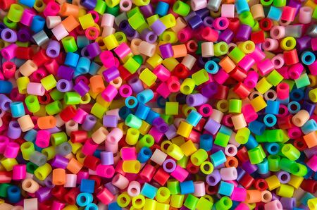 Toy for the baby close-up. Educational toys for children. thermo-mosaic, beads.の写真素材