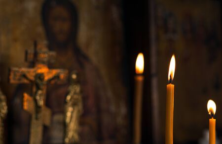 Christmas. religion postcard with new year. Jesus on a background of candles.の写真素材