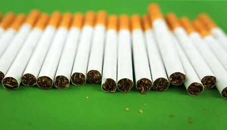 cigarettes with tobacco close-up. nicotine addiction and harm to health.の写真素材