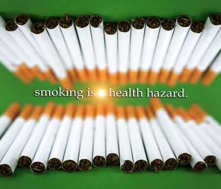 cigarettes with tobacco close-up. nicotine addiction and harm to health.の写真素材