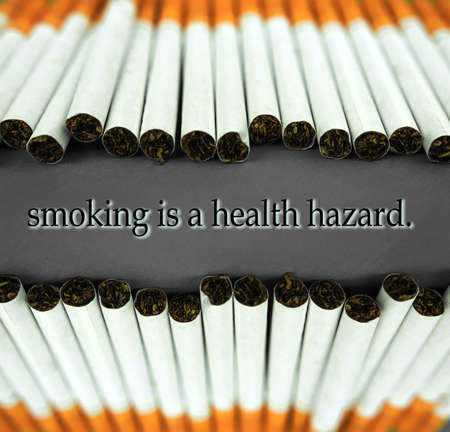 cigarettes with tobacco close-up. nicotine addiction and harm to health.の写真素材