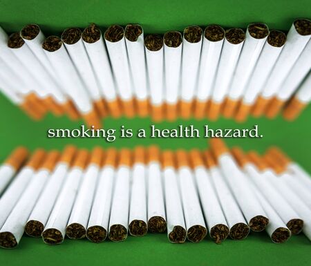cigarettes with tobacco close-up. nicotine addiction and harm to health.の写真素材