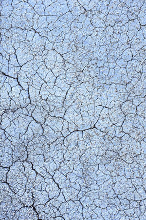 texture of rough putty on the wall. cracked earth backgroundの写真素材