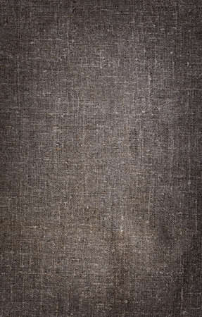 Burlap close-up, natural coarse cloth, tablecloth with foldsの写真素材