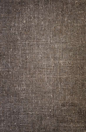 Burlap close-up, natural coarse cloth, tablecloth with foldsの写真素材