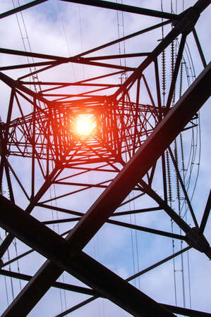 high-voltage power lines at sunset. electricity distribution station. high voltage electric transmission tower.の写真素材