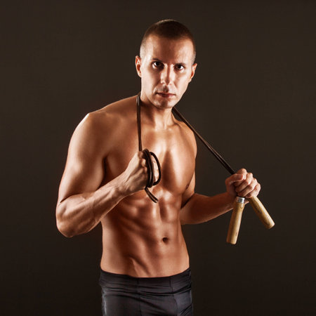 Portrait of young handsome body builder の写真素材