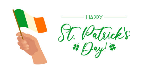 Happy St. Patricks Day horizontal banner. Hand with the flag of Ireland. Four leaf clover, symbol of good luck. Religious traditions. For banner, website, poster, flyerのイラスト素材