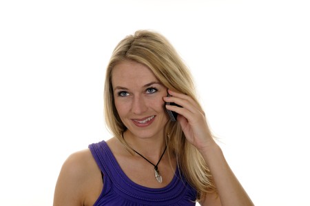 young woman with handyの写真素材