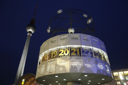 Alexanderplatz with world time clock and television tower at night in berlinのeditorial素材