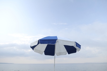 sun chair in front of blue skyの写真素材