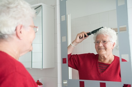 grandma is combing the hairの写真素材