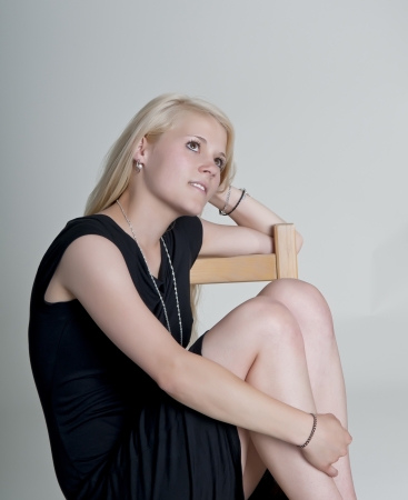 thoughtful young blond womanの写真素材