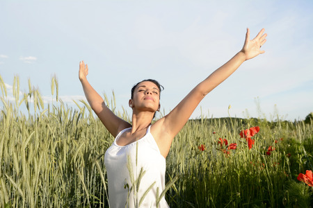 smiling young woman feeling free smiling young woman feeling free