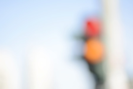 blurred background, yellow and red traffic lightの写真素材