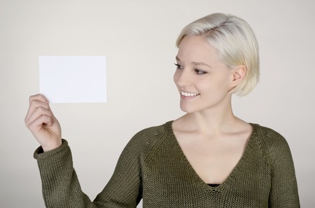 woman with white business cardの写真素材