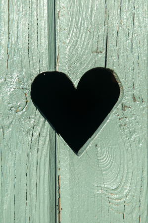heart in a wooden doorの写真素材