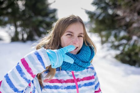 young girl showing victory signの写真素材