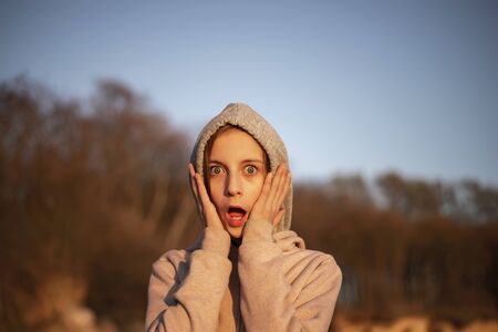 young blond girl is scared
