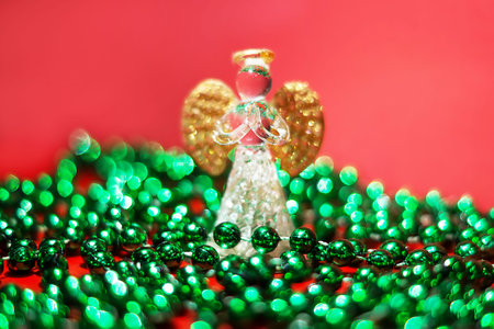 Christmas decoration on red background with bokeh defocused lights.の写真素材