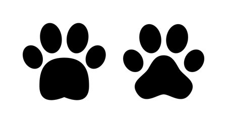 Paw icon vector illustration. paw print sign and symbol. dog or cat pawのイラスト素材