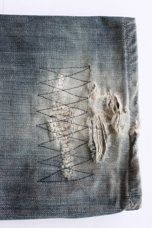 close-up Pant legs of the blue jeansの写真素材